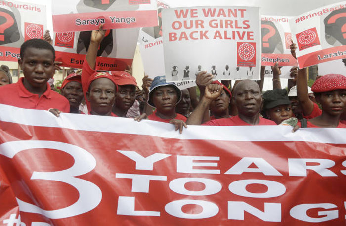 Bring back our girls campaigners chant slogans during a protest calling on the government to rescue the remaining kidnapped girls of the government secondary school who were abducted almost three years ago, in Lagos, Nigeria. — AP