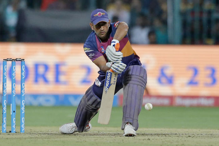 Rising Pune Supergiants Mahendra Singh Dhoni prepares to play a shot during their Indian Premier League (IPL) cricket match against Royal Challengers Bangalore in Bangalore, India. — AP