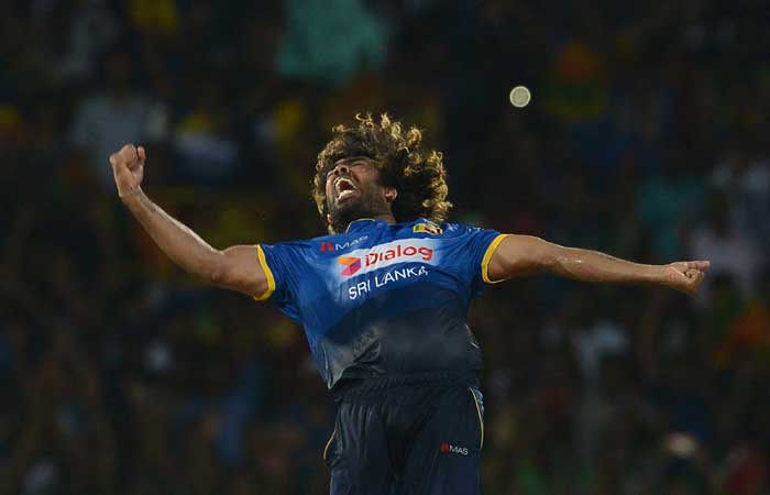 Sri Lankan cricketer Lasith Malinga celebrates in this file photo. Malinga has been picked by Sri Lanka for the Champions Trophy. – AFP