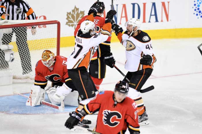 Anaheim Ducks center Rickard Rakell (67) and center Nate Thompson (44) celebrate the win over the Calgary Flames in game three of the first round of the 2017 Stanley Cup Playoffs at Scotiabank Saddledome. The Ducks won 5-4 in overtime. — Reuters