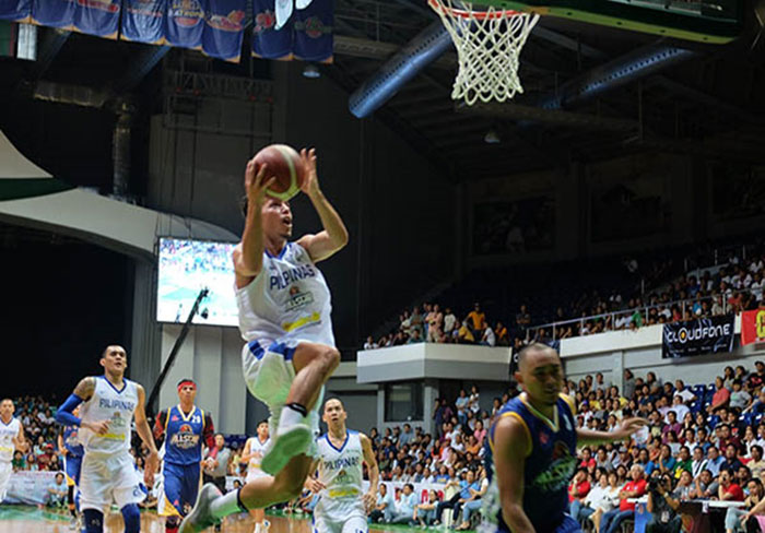 Gilas Pilipinas' Matthew Wright scores against Paul Lee of Luzon All Stars during the Lucena stop of the PBA's All-Star week Friday night.
