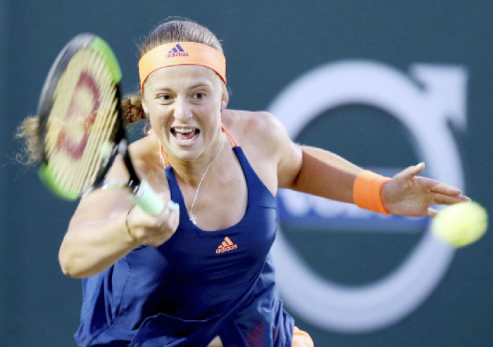 Jelena Ostapenko of Latvia hits a forehand to Caroline Wozniacki of Denmark at the Volvo Car Open Tennis Tournament in Charleston Friday. — AP