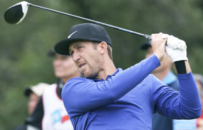 Kevin Chappell hits into the wind on the 9th tee during the third round of the Valero Texas Open at TPC San Antonio Oaks Course in San Antonio Saturday. — AP