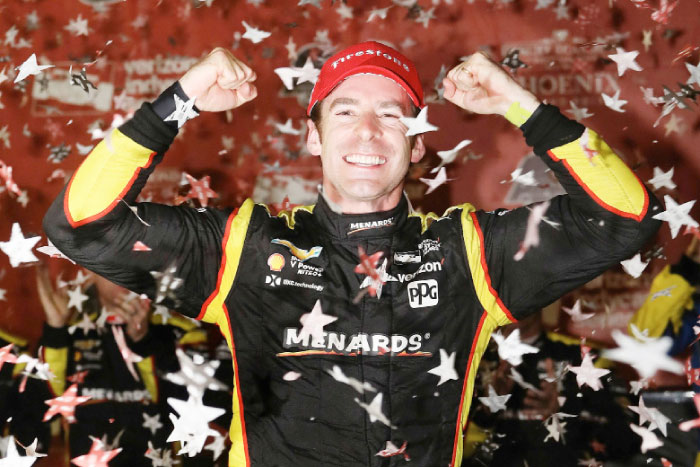 Simmon Pagenaud of France, driver of the #1 Team Penske Chevrolet, celebrates after winning the Desert Diamond West Valley Phoenix Grand Prix at Phoenix International Raceway in Avondale, Arizona, Saturday. — AFP