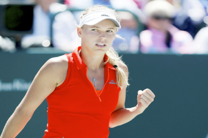 Caroline Wozniacki of Denmark reacts as she plays Annika Beck of Germany at the Volvo Car Open Tennis Tournament in Charleston Thursday. — AP