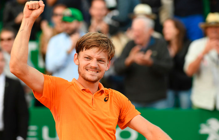 Belgium's David Goffin celebrates after winning over Serbia's Novak Djokovic at the Monte-Carlo ATP Masters Series Tournament Friday. — AFP