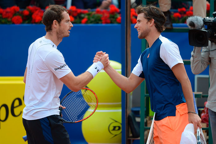 Andy Murray (L) of Britain congratulates Dominic Thiem of Austria at the ATP Barcelona Open 