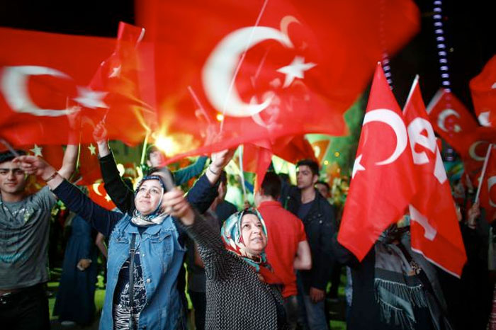 Supporters of Turkish President Tayyip Erdogan celebrate at the AK party headquarters in Izmir Turkey. Reuters