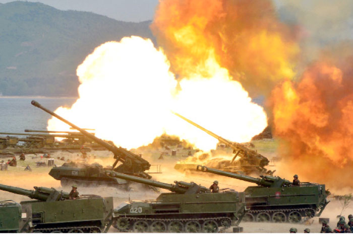 This photo distributed on Wednesday by the North Korean government shows what was said to be a “Combined Fire Demonstration” held to celebrate the 85th anniversary of the North Korean army, in North Korea. — AP