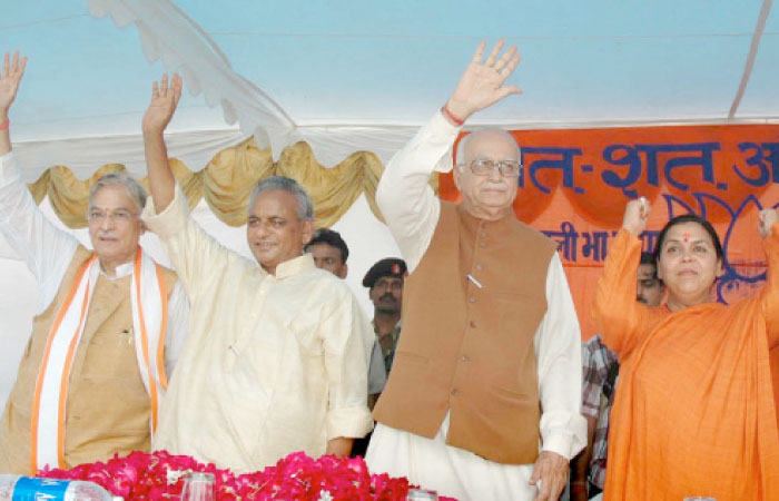 Senior Bharatiya Janata Party leader L.K. Advani, second right, Uma Bharati, right, Kalyan Singh, second left, and Murli Manohar Joshi wave to people during a public rally in Rae Bareilly, in the northern Indian state of Uttar Pradesh, in this July 28, 2005 file photo. — AP