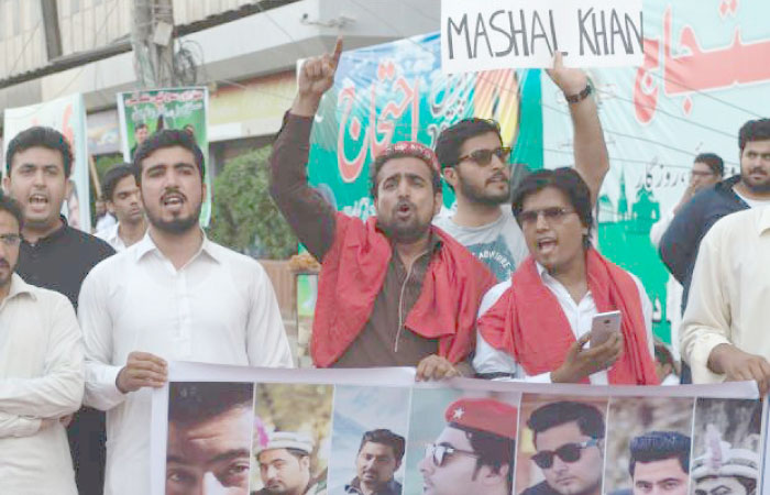 Pakistani activists shout slogans during a protest in Karachi against the killing of student Mashal Khan in this April 14, 2017 file photo. — AFP