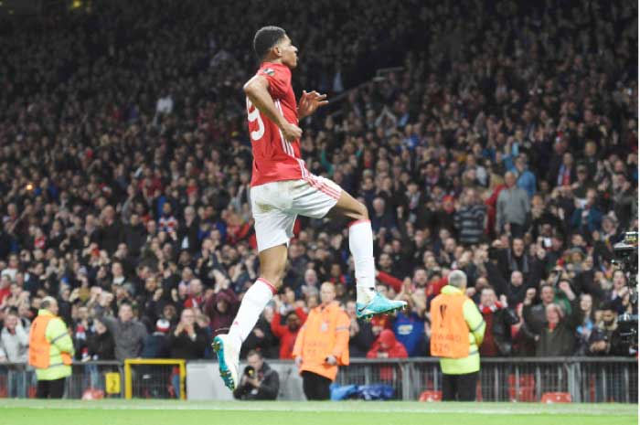 Manchester United’s striker Marcus Rashford celebrates scoring the winner during the UEFA Europa League quarterfinal second leg match against Anderlecht at Old Trafford in Manchester Thursday. — AFP