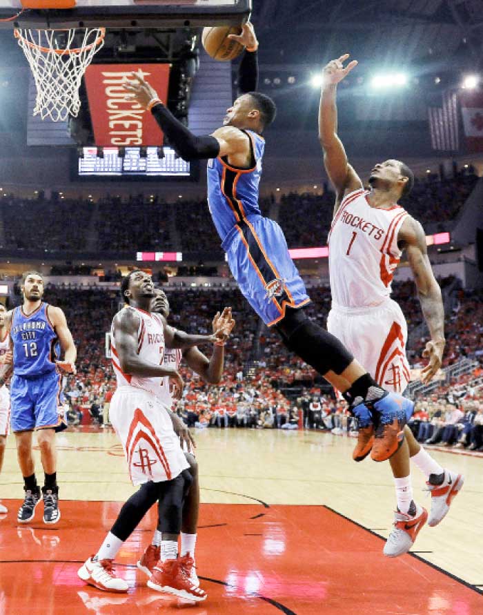 Oklahoma City Thunder’s guard Russell Westbrook drives to the basket against Houston Rockets in Game 2 of their NBA playoff series in Houston Wednesday. — AP