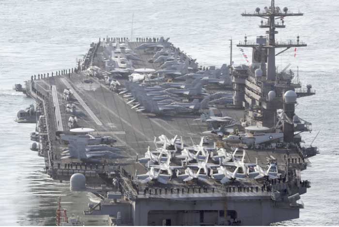 US Navy aircraft carrier, the USS Carl Vinson, approaches Busan port in Busan, South Korea, to participate in an annual joint military exercise called Foal Eagle between South Korea and the United States in this March 15, 2017 file photo. — AP