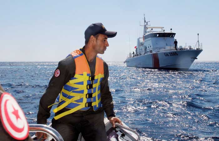 A member of the Tunisian coast guard inspects the maritime borders in the region off Tunisia’s northern town of Bizerte during a 24-hour patrol of the area last month. Migrants seeking a better future have long used the Tunisian coast as a launchpad for bids to reach Italy. But in recent years, Tunisian authorities have had to learn to tackle a new form of smuggling — contraband coming from Europe. — AFP