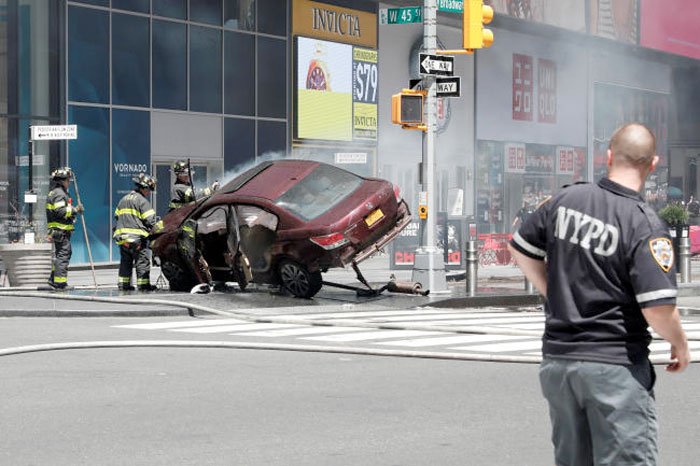 A vehicle that struck pedestrians and later crashed is seen on the sidewalk in New York City, US. — Reuters