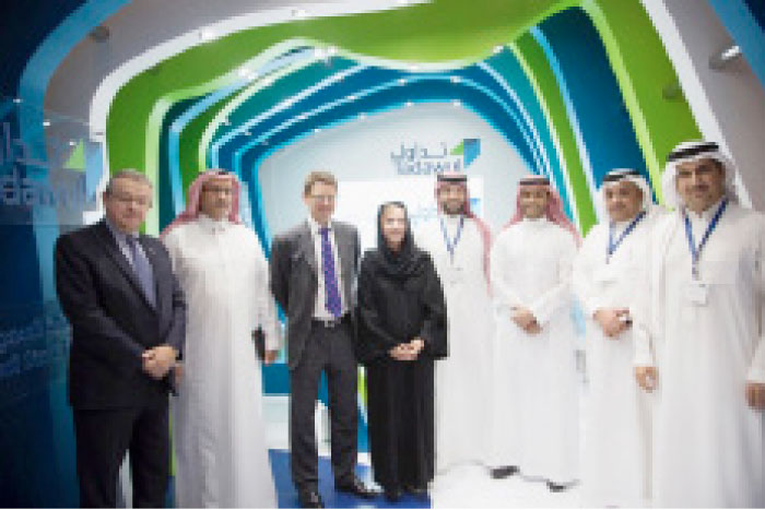 Executives of Tadawul and MEIRA pose for a group photo
