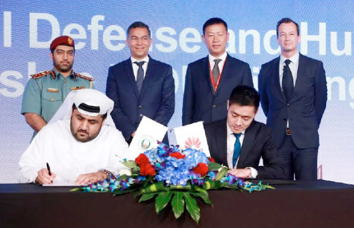 Officials of Dubai Civil Defense and Huawei sign the historic MoU to collaborate on a number of ICT initiatives