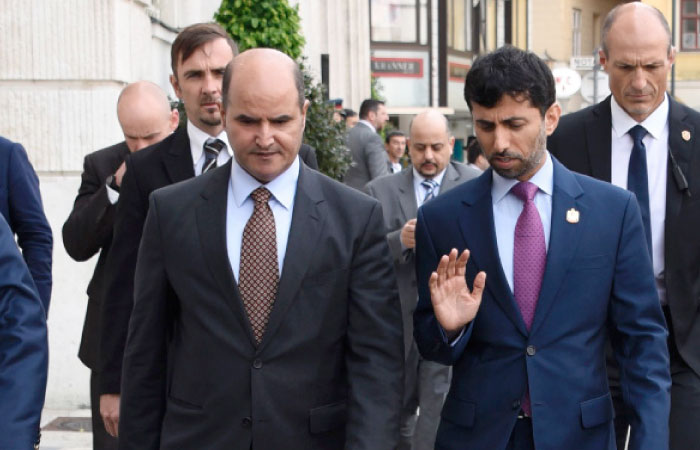 UAE Minister of Energy Suhal Mohamed Al Mazrouri (R) and Kuwat›s Minister of Oil  Issam A Almarzoog take a walk in Vienna, Austria on May 24on the eve of the Organization of the Petroleum Exporting Countries meeting — AFP