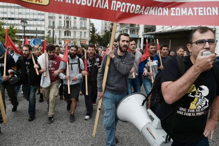 Protesters demonstrate in Athens during a 24-hour general strike against a new round of austerity cuts imposed by the country's international creditors in Athens, on May 17, 2017. Thousands of Greeks demonstrated today against a new round of austerity cuts in a 24-hour general strike that disrupted travel and shut down public services. — AFP