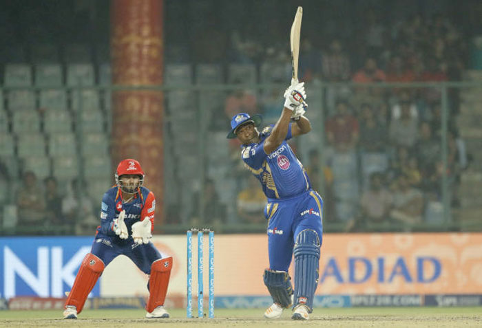 Mumbai Indians' Kieron Pollard, right, plays a shot during the Indian Premier League (IPL) cricket match against Delhi Daredevils in New Delhi, India  — AP