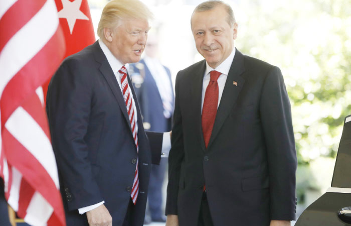 President Donald Trump (left), welcomes Turkish President Recep Tayyip Erdogan to the White House in Washington, Tuesday – AP