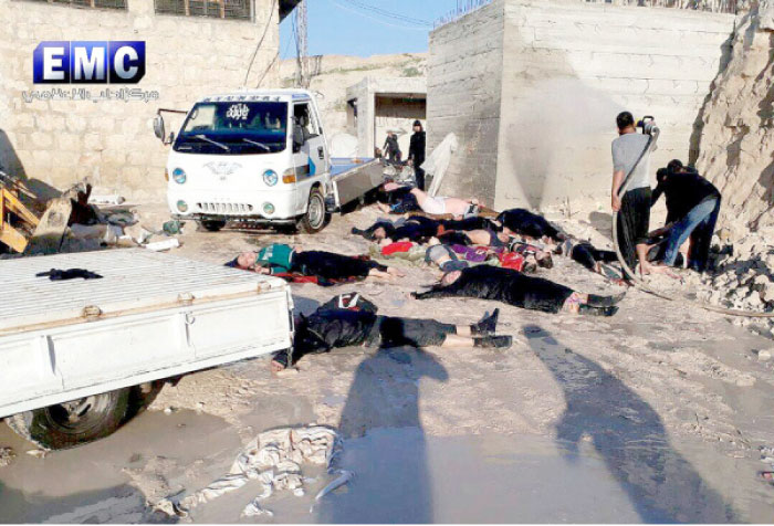 The photo provided by the Syrian anti-government activist group Edlib Media Center, which has been authenticated based on its contents and other AP reporting, shows victims of a suspected chemical attack in the town of Khan Sheikhoun, northern Idlib province, Syria. — AP