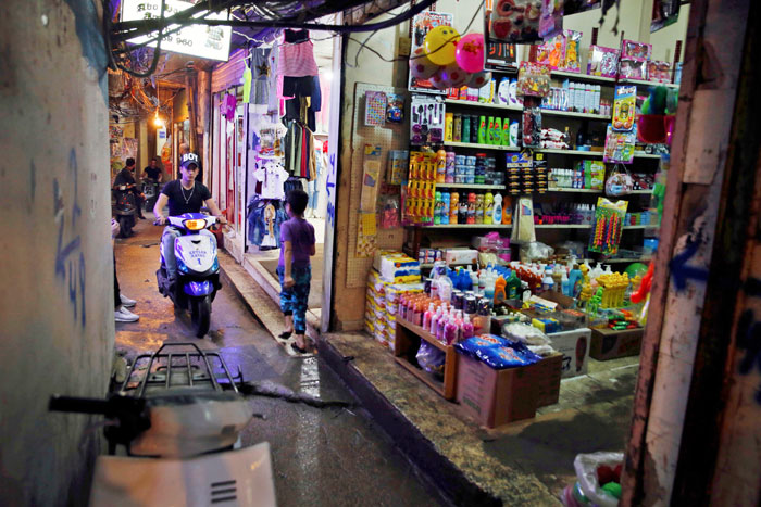 In this file photo, a teenager rides his scooter inside the Bourj Al-Barajneh Palestinian refugee camp in Beirut. — AP