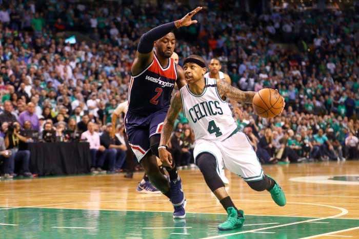 Isaiah Thomas of the Boston Celtics drives against John Wall of the Washington Wizards during Game 2 of the Eastern Conference semifinals at TD Garden in Boston Tuesday. — AFP