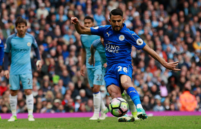 Leicester City's Riyad Mahrez scores from the penalty spot but it is disallowed for kicking the ball twice against Manchester City during their Premier League match at the Etihad Stadium Saturday. — Reuters