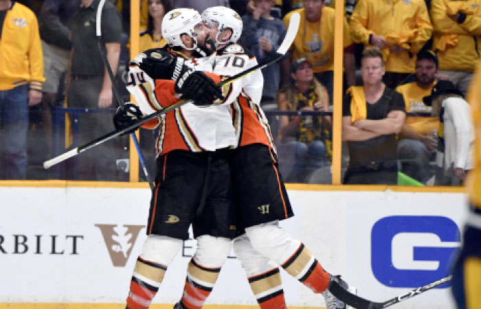 Anaheim Ducks’ center Nate Thompson (L) and right wing Corey Perry celebrate after their 3-2 overtime win against the Nashville Predators in Game 4 of the NHL Western Conference finals at Bridgestone Arena in Nashville Thursday. — Reuters