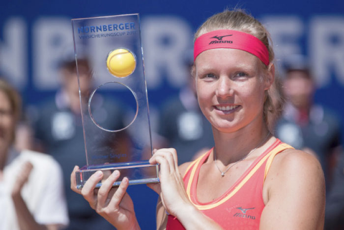 Kiki Bertens of the Netherlands poses with the trophy after defeating Czech player Barbora Krejcikova in the final match of the WTA Tennis Tournament in Nuremberg, Germany, Saturday. –  AP