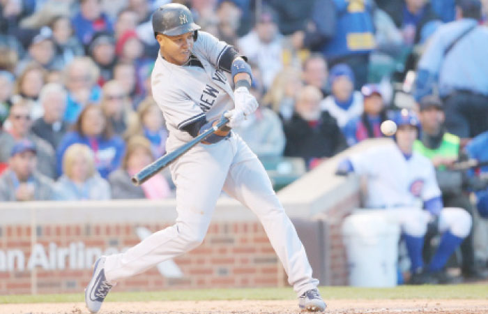 New York Yankees’ second baseman Starlin Castro hits a 2 RBI home run during their MLB game against the Chicago Cubs at Wrigley Field in Chicago Saturday. — Reuters