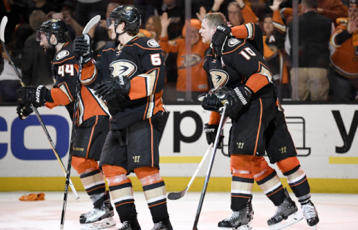 The Anaheim Ducks’ players celebrate after the game-winning goal by Corey Perry (No. 10) in Game 5 of the Stanley Cup Playoffs against the Edmonton Oilers at Honda Center in Anaheim Friday. — Reuters