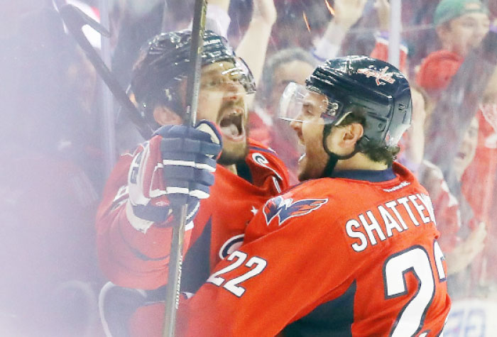 Alex Ovechkin (L) of the Washington Capitals celebrates with teammate Kevin Shattenkirk after scoring against the Pittsburgh Penguins during Game 5 of their Stanley Cup Playoffs at the Verizon Center in Washington Saturday. — AFP