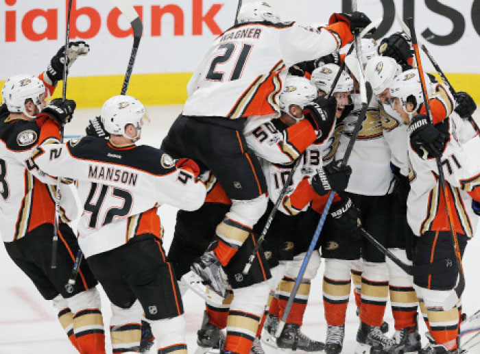 Anaheim Ducks’ players celebrate an overtime winning goal by their forward Jakob Silfverberg against Edmonton Oilers in Game 4 of the Stanley Cup Playoffs at Rogers Place in Edmonton Wednesday. — Reuters