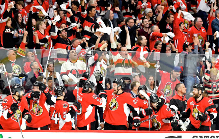 Ottawa Senators players and fans celebrate their victory over Pittsburgh Penguins in Game 6 of the NHL Eastern Conference finals at Canadian Tire Centre in Ottawa Tuesday. — Reuters