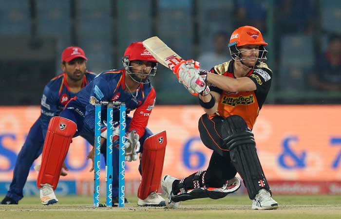 File photo shows Sunrisers Hyderabad's batsman David Warner preparing to play a reverse sweep shot during a Indian Premier League (IPL) cricket match. — AP