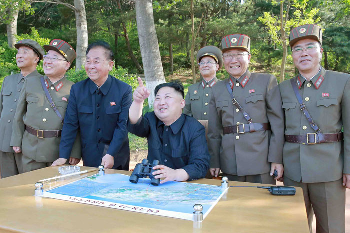 North Korean leader Kim Jong Un inspects the intermediate-range ballistic missile Pukguksong-2’s launch test with Kim Jong Sik (2nd L), Ri Pyong Chol (3rd L) and Jang Chang Ha (R) in this undated photo released by North Korea’s Korean Central News Agency. — Reuters