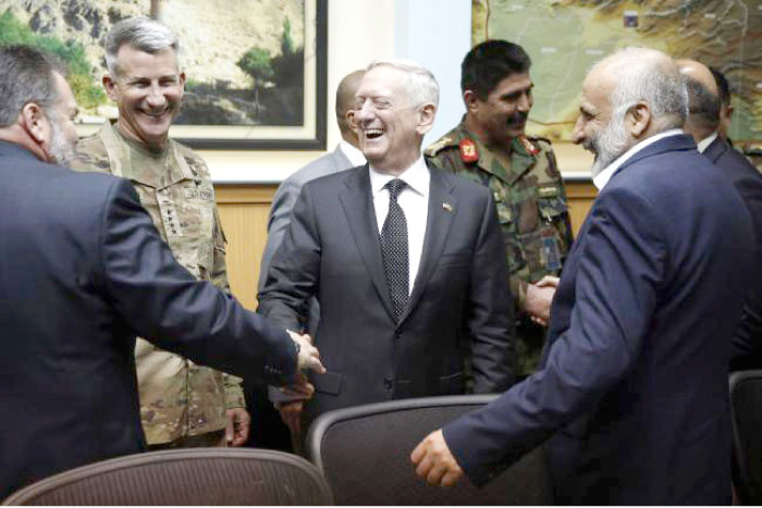 US Defense Secretary James Mattis, center, and US Army General John Nicholson, second left, commander of US Forces Afghanistan, meet with Afghanistan’s National Directorate of Security Director Mohammad Masoom Stanekzai, right, and other members of the Afghan delegation at Resolute Support headquarters in Kabul in this April 24, 2017 file photo. — AFP