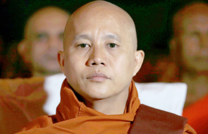 Buddhist monk Ashin Wirathu looks on as he attends a convention held by the Bodu Bala Sena (Buddhist Power Force, BBS) in Colombo, Sri Lanka, in this Sept. 28, 2014 file photo. — Reuters