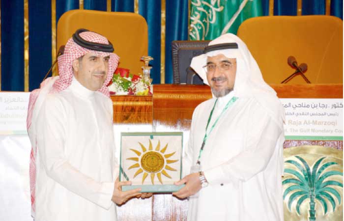 Alinma Bank CEO getting honored at the General Auditing Bureau’s 14th annual seminar in Riyadh. — Courtesy photo