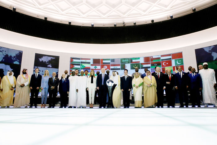 Custodian of the Two Holy Mosques King Salman, US President Donald Trump and leaders of Muslim countries stand for a family photo at the Global Center for Combatting Extremist Ideology in Riyadh on Sunday. — Reuters
