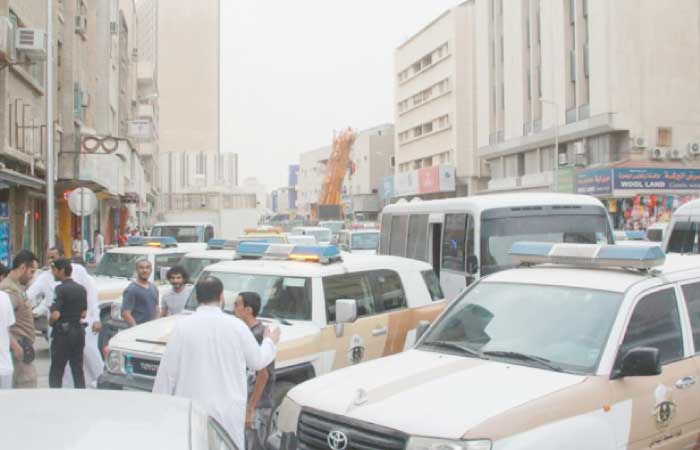 Intensive raids by Riyadh police continued for nine hours on Monday. — SG photo by Mishal Al-Otaibi