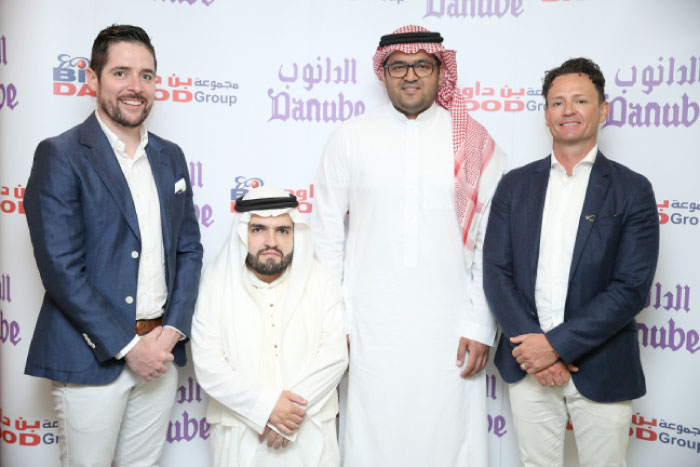 Paul Kenny, Majed M Al Tahan, Ahmad AR BinDawood, and Douglas Collins during the launch event