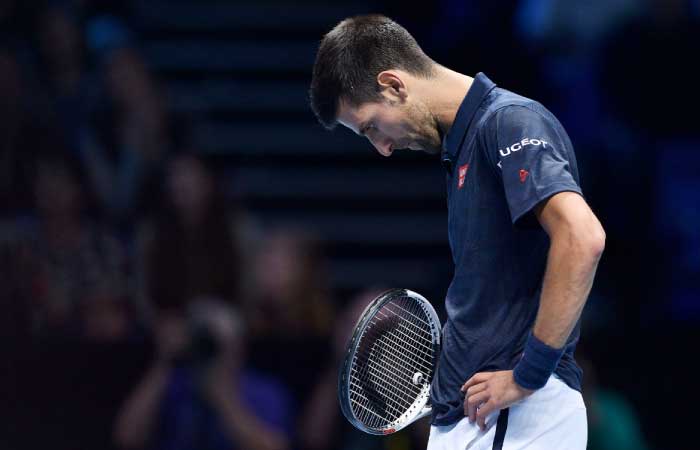 This file photo shows Serbia's Novak Djokovic reacting after losing a point during a match in London. — AFP