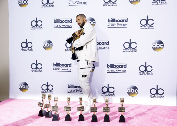 Drake poses with awards he picked up at the 2017 Billboard Music Awards in Las Vegas, Nevada on Monday. - Reuters