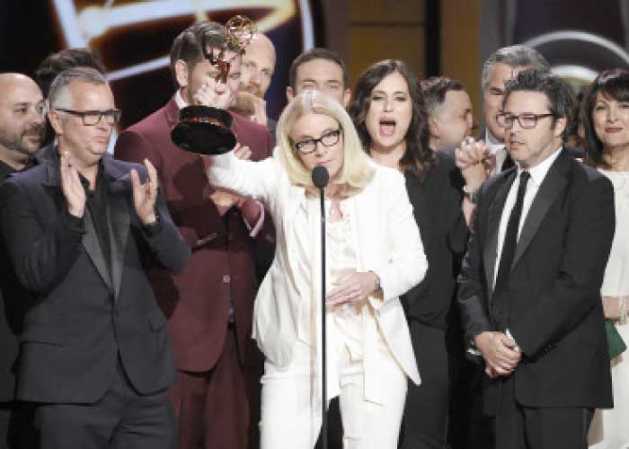 Mary Connelly, center, accepts the award for outstanding entertainment talk show for “The Ellen DeGeneres Show” at the 44th annual Daytime Emmy Awards at the Pasadena Civic Center on Monday in Pasadena, California. - AP