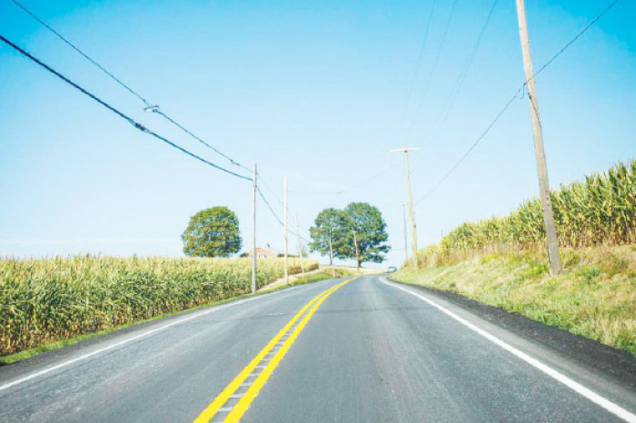 A two lane road rises up toward trees somewhere between Pittsburgh and Gettysburg, Pennsyl’ania. — AP