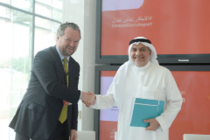 Governor of the SME Authority Dr. Ghassan Al Sulaiman and Vice-Chairman of Global Consulting at Deloitte John Kerr shake hands after HUB1006 signing ceremony in Riyadh on Monday. — Courtesy photo